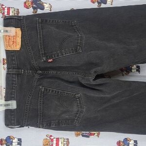 Y2K Levi's 501 button fly black wash fade straight leg denim jeans Size 33 / 34